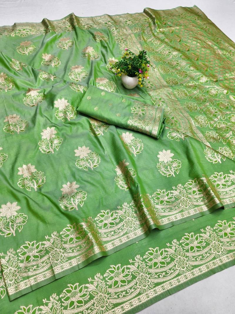 Green zari woven banarasi silk blend saree with blouse piece