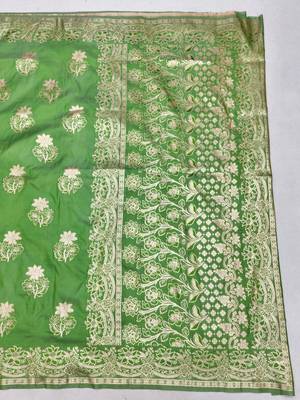 Green zari woven silk blend saree with blouse piece 2