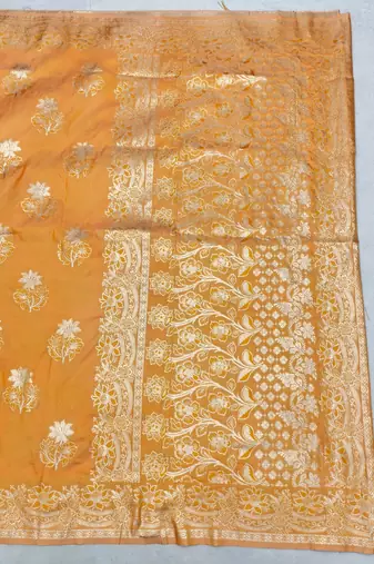 Orange zari woven silk blend saree with blouse piece