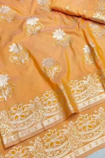 Orange zari woven silk blend saree with blouse piece