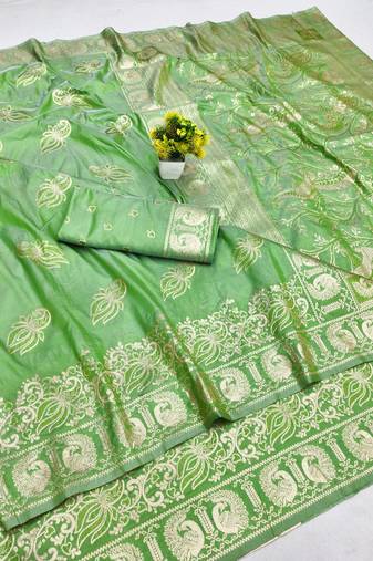 Green zari woven banarasi silk blend saree with blouse piece