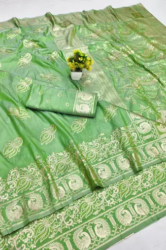 Green zari woven banarasi silk blend saree with blouse piece