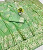 Green zari woven banarasi silk blend saree with blouse piece