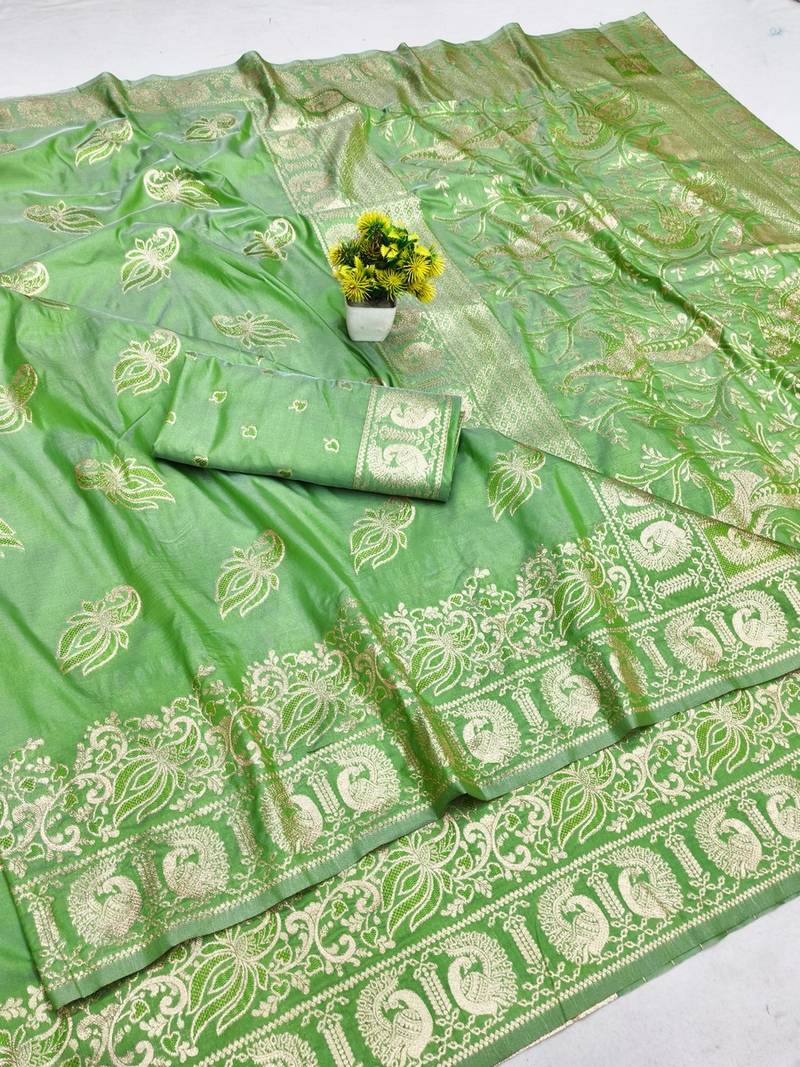 Green zari woven banarasi silk blend saree with blouse piece