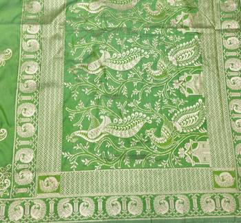 Green zari woven silk blend saree with blouse piece 5