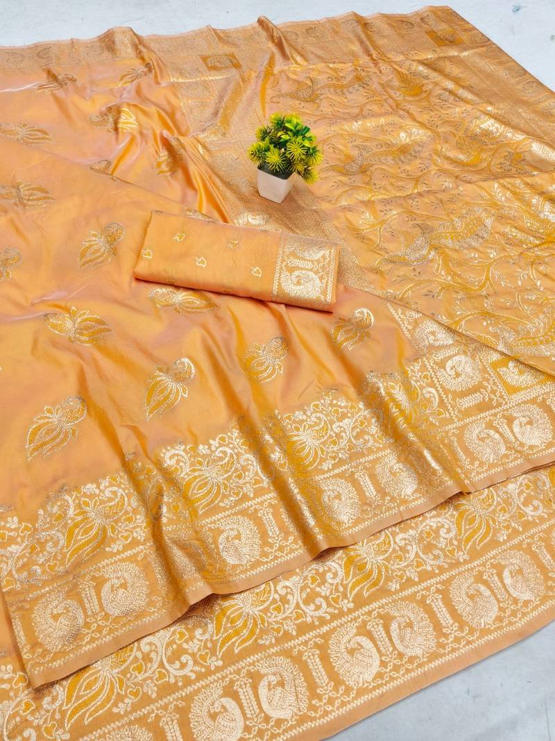 Orange zari woven banarasi silk blend saree with blouse piece