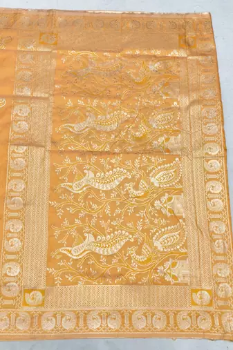 Orange zari woven silk blend saree with blouse piece