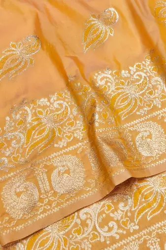 Orange zari woven silk blend saree with blouse piece