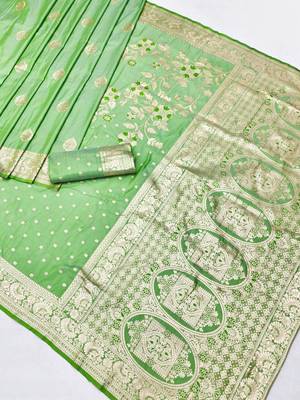 Light green zari woven silk blend saree with blouse piece 2