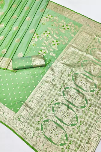 Light green zari woven silk blend saree with blouse piece
