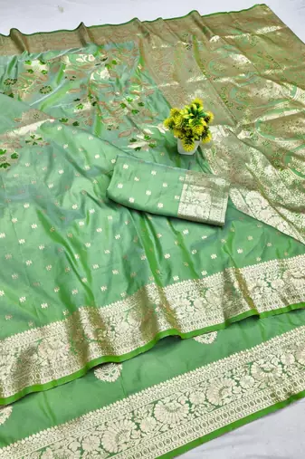 Light green zari woven banarasi silk blend saree with blouse piece
