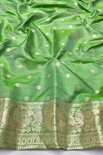 Light green zari woven silk blend saree with blouse piece