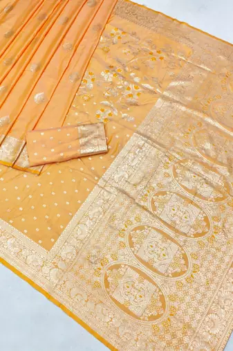 Light orange zari woven silk blend saree with blouse piece