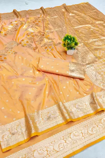 Light orange zari woven banarasi silk blend saree with blouse piece