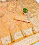 Light orange zari woven banarasi silk blend saree with blouse piece