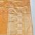 Light orange zari woven banarasi silk blend saree with blouse piece