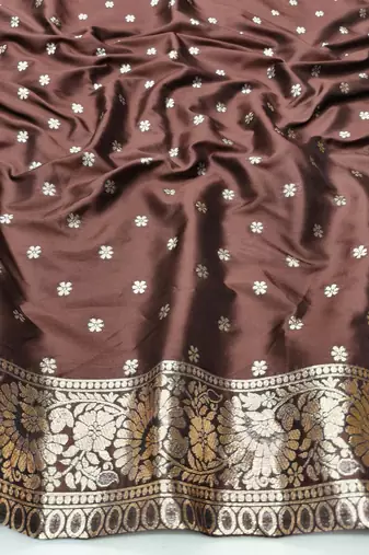 Brown zari woven silk blend saree with blouse piece