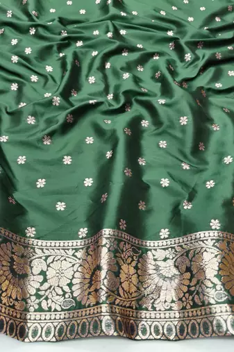 Dark green zari woven silk blend saree with blouse piece