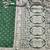 Dark green zari woven banarasi silk blend saree with blouse piece