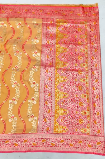 Orange zari woven leheria silk blend saree with blouse piece