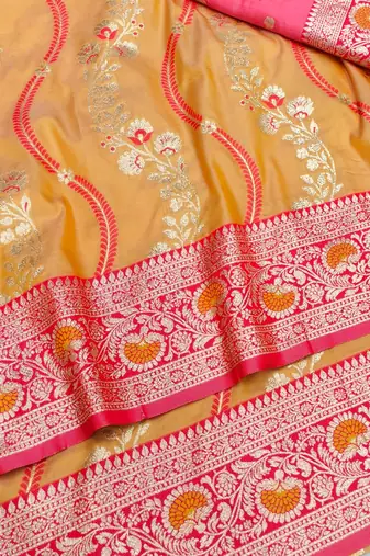 Orange zari woven leheria silk blend saree with blouse piece