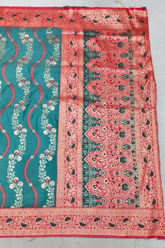 Light blue zari woven leheria silk blend saree with blouse piece