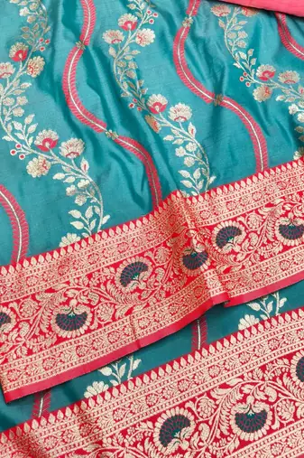 Light blue zari woven leheria silk blend saree with blouse piece