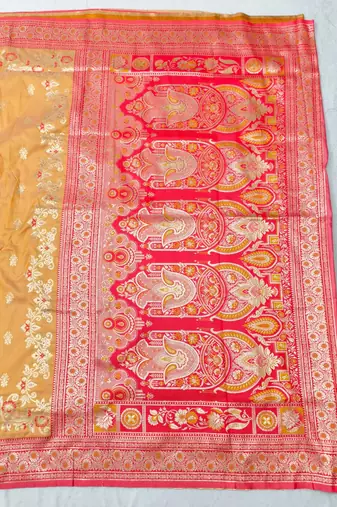 Orange zari woven silk blend saree with blouse piece