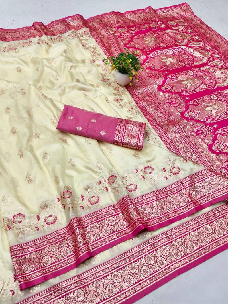 Cream zari woven banarasi silk blend saree with blouse piece