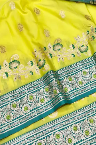 Lime zari woven silk blend saree with blouse piece