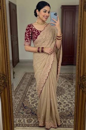 Beige georgette embroidered saree with thread work