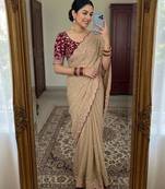 Beige georgette embroidered saree with thread work