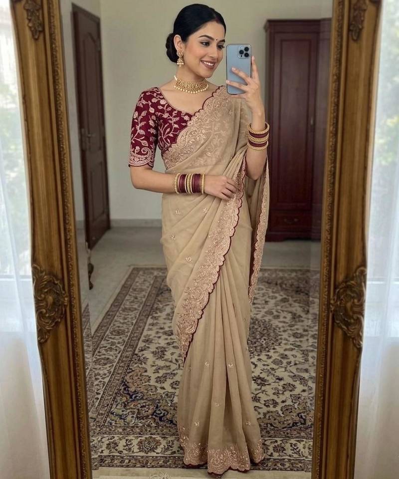 Beige georgette embroidered saree with thread work