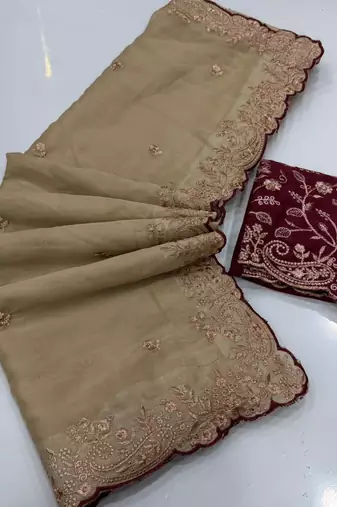 Beige georgette embroidered saree with thread work