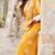 Yellow net embroidered saree with sequins work