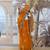 Yellow net embroidered saree with sequins work