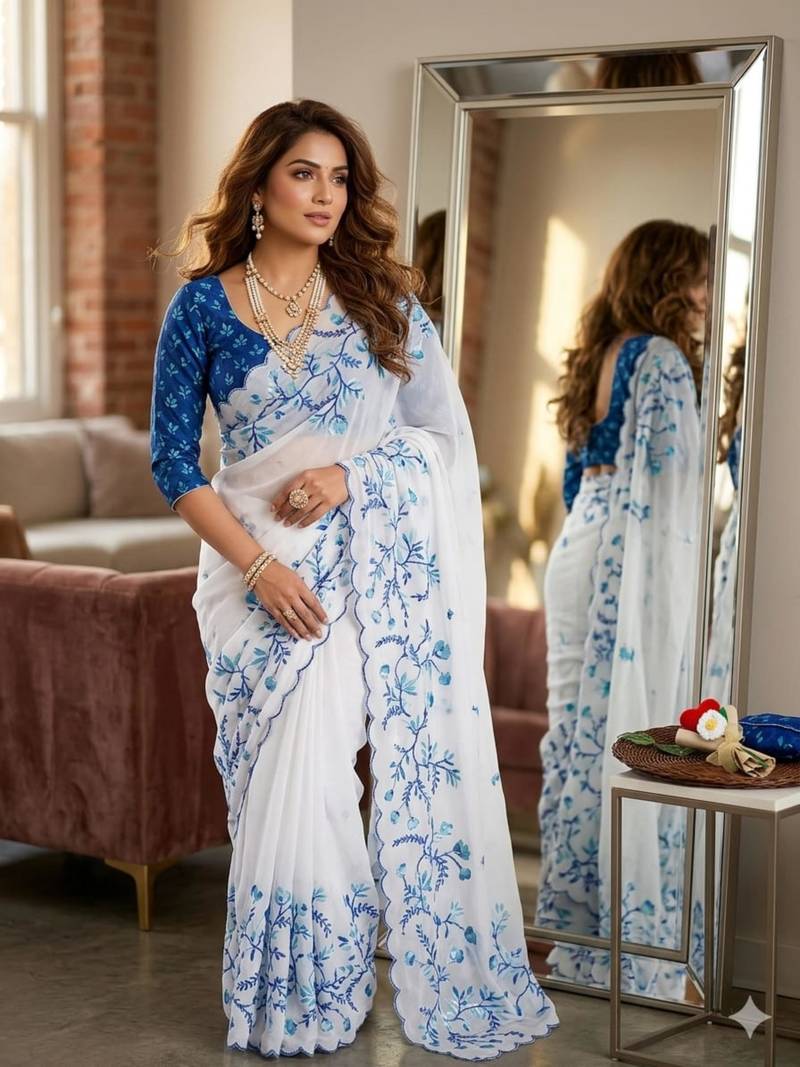white silk blend saree with floral print