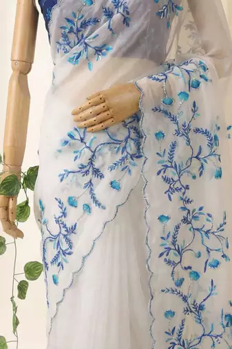 white silk blend saree with floral print