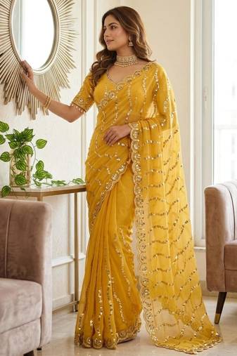 yellow silk blend embroidered saree with sequins work