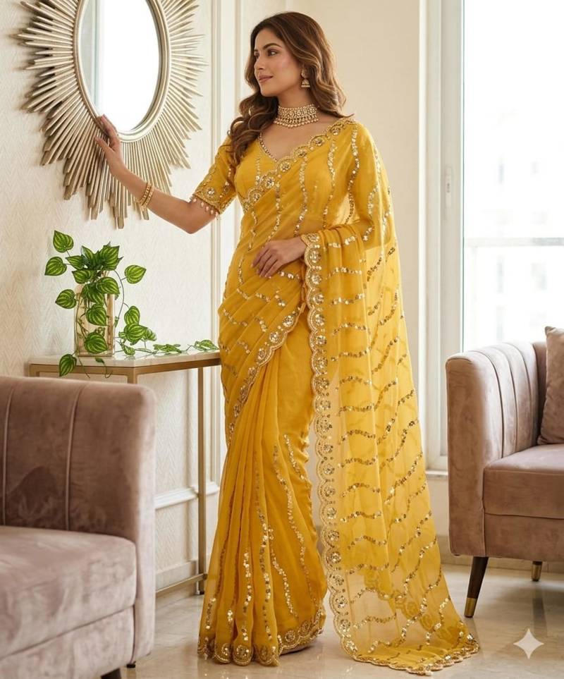 yellow silk blend embroidered saree with sequins work