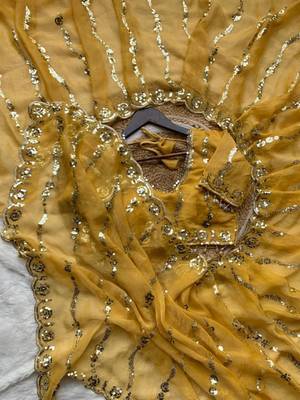 yellow silk blend embroidered saree with sequins work 3