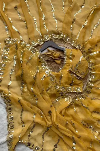 yellow silk blend embroidered saree with sequins work