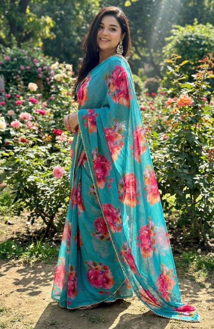 Blue georgette printed saree with floral print