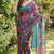 Teal georgette printed saree with floral print