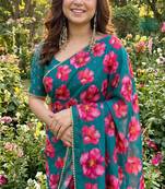 Teal georgette printed saree with floral print