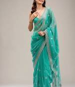 Dark sea green chiffon embroidered saree with thread work