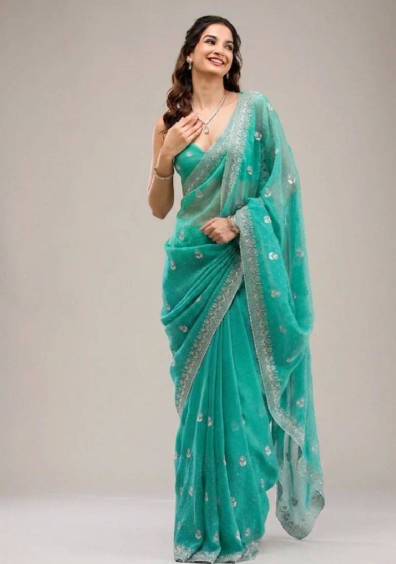 Dark sea green chiffon embroidered saree with thread work