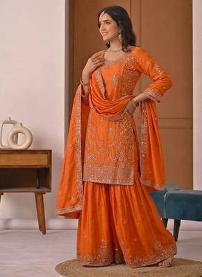 Orange silk blend embroidered sharara suit set with dupatta 3