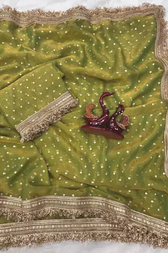 green fancy lace border with jaquard butti silk saree