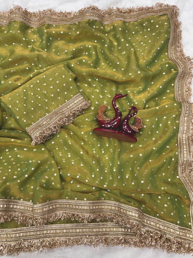 green fancy lace border with jaquard butti silk saree